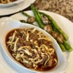 Italian pot roast and noodles with asparagus.