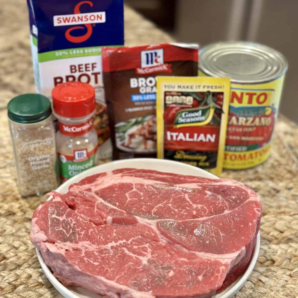 Ingredients to make a slow cooker Italian beef recipe.