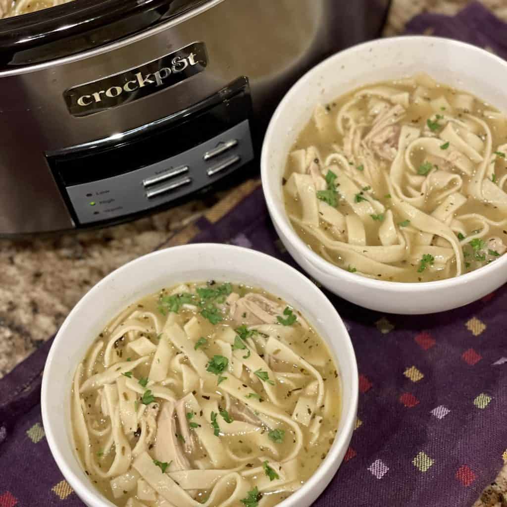 bowls of chicken and noddles