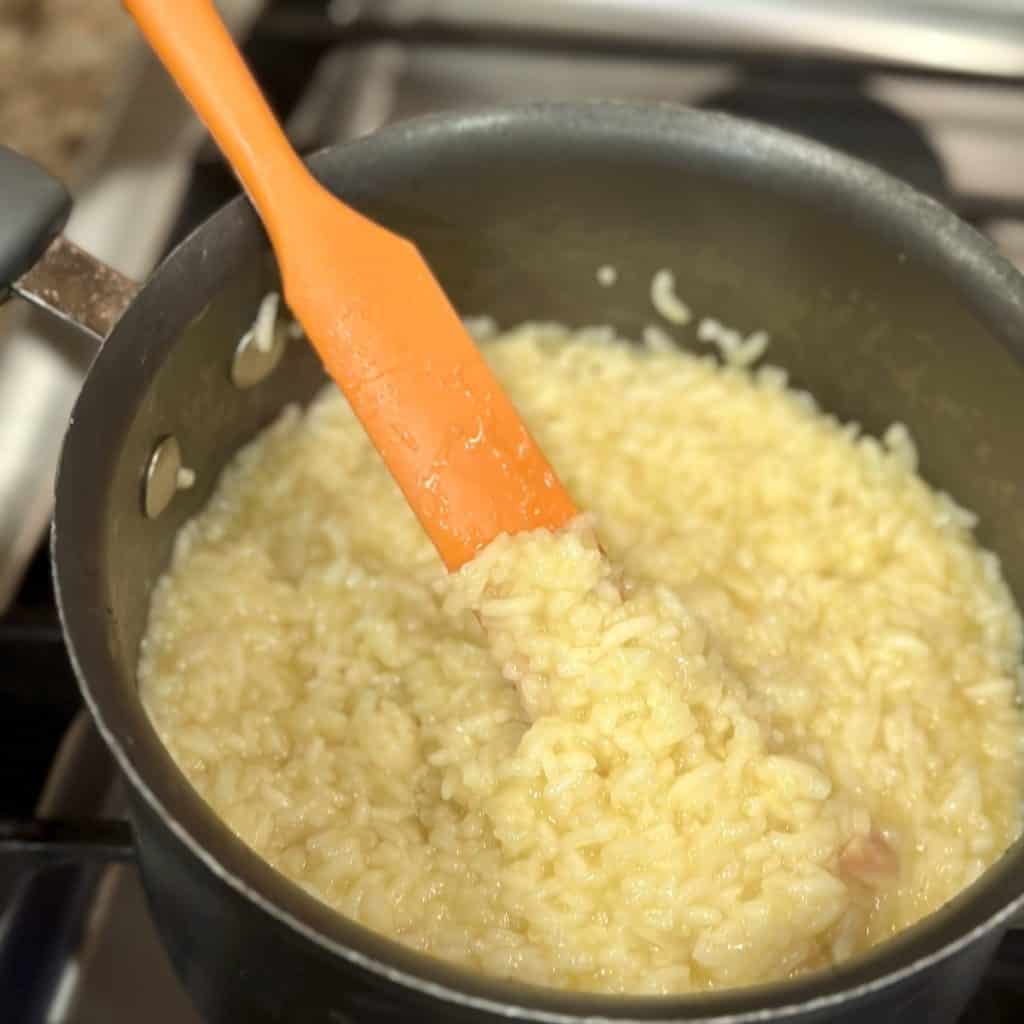 Cooked rice in a sauce pan.