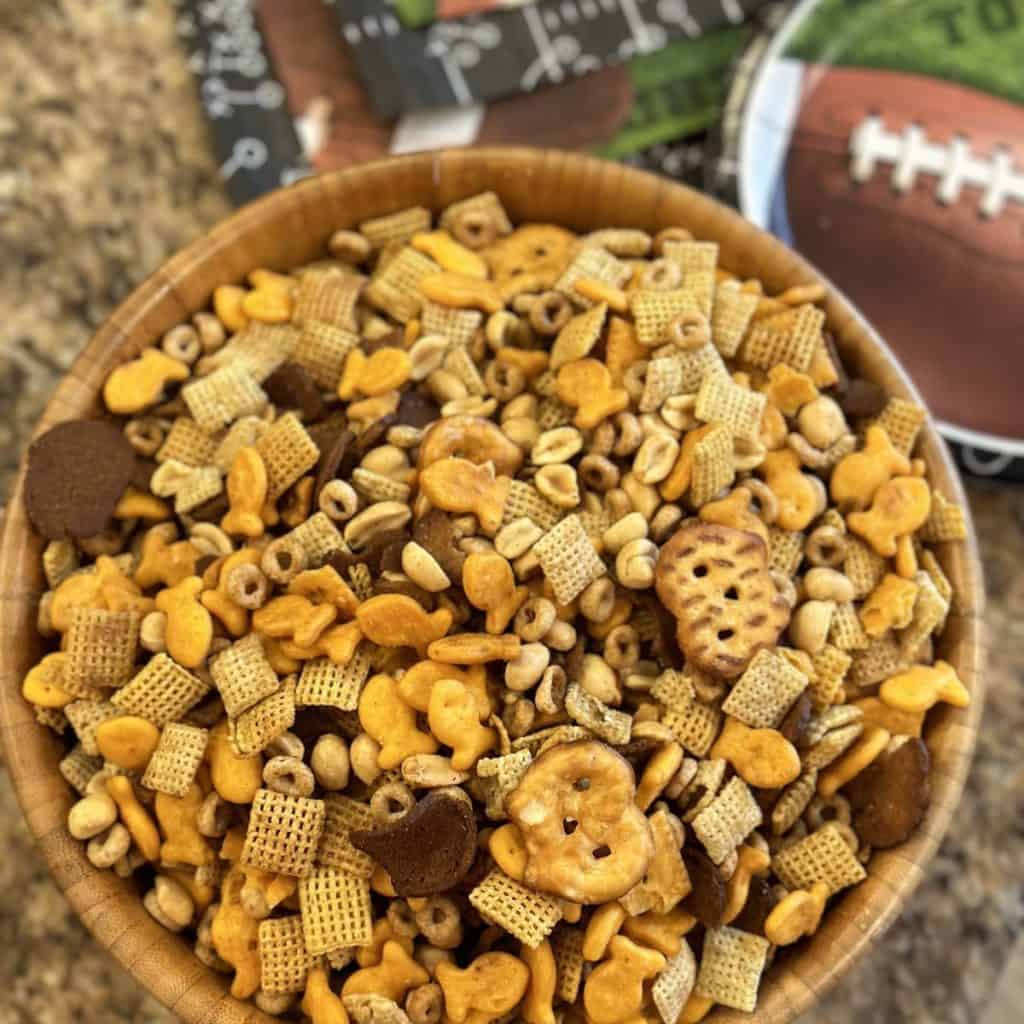 A bowl of chex at a sport party.
