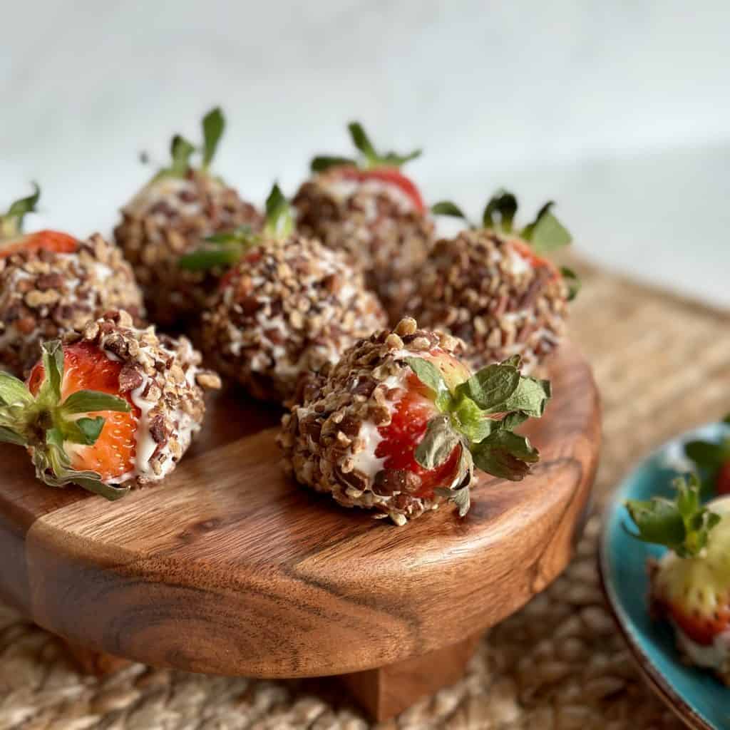 cream cheese-dipped strawberries coated in nuts