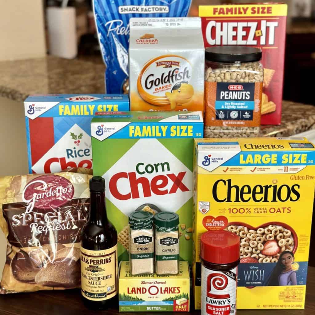 The ingredients to make chex party mix.
