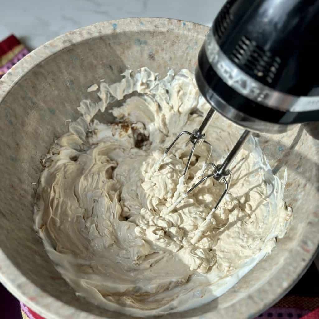 Whipping up an onion dip in a bowl