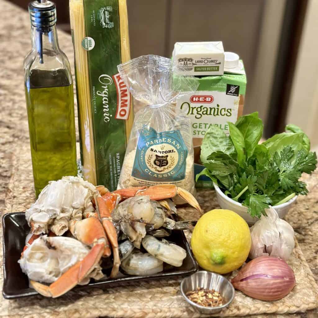 The ingredients to make shrimp and crab scampi.