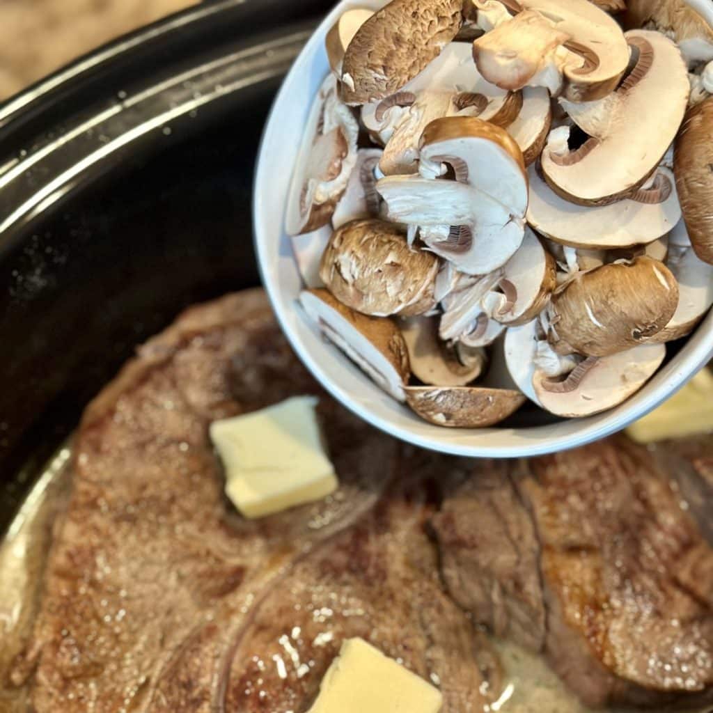 Roast in a crockpot with butter and mushrooms on top.
