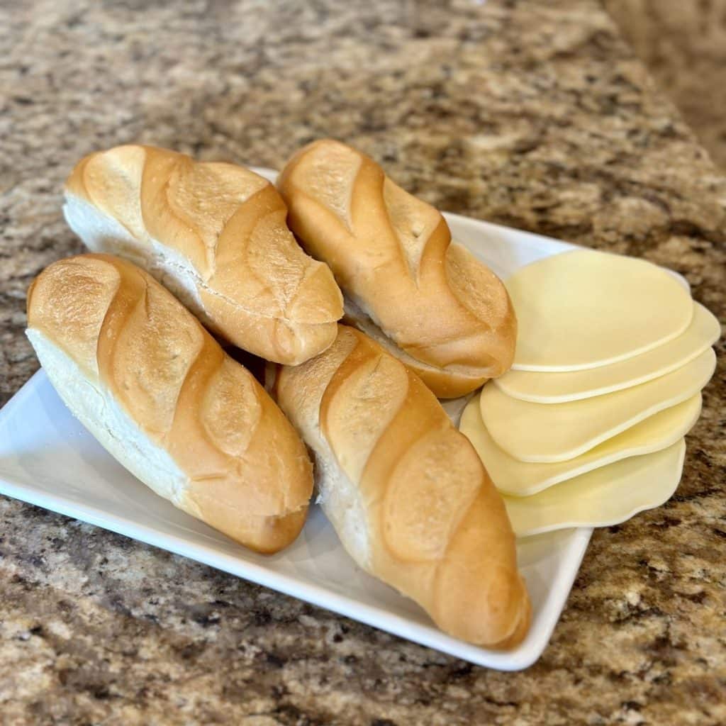 Hoagie buns and cheese for sandwiches.