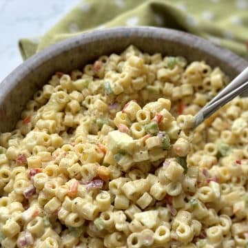 Macaroni salad in a serving bowl.