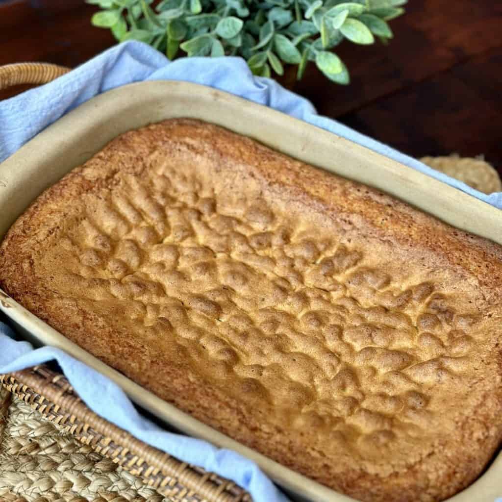 A full sad cake in a pan.