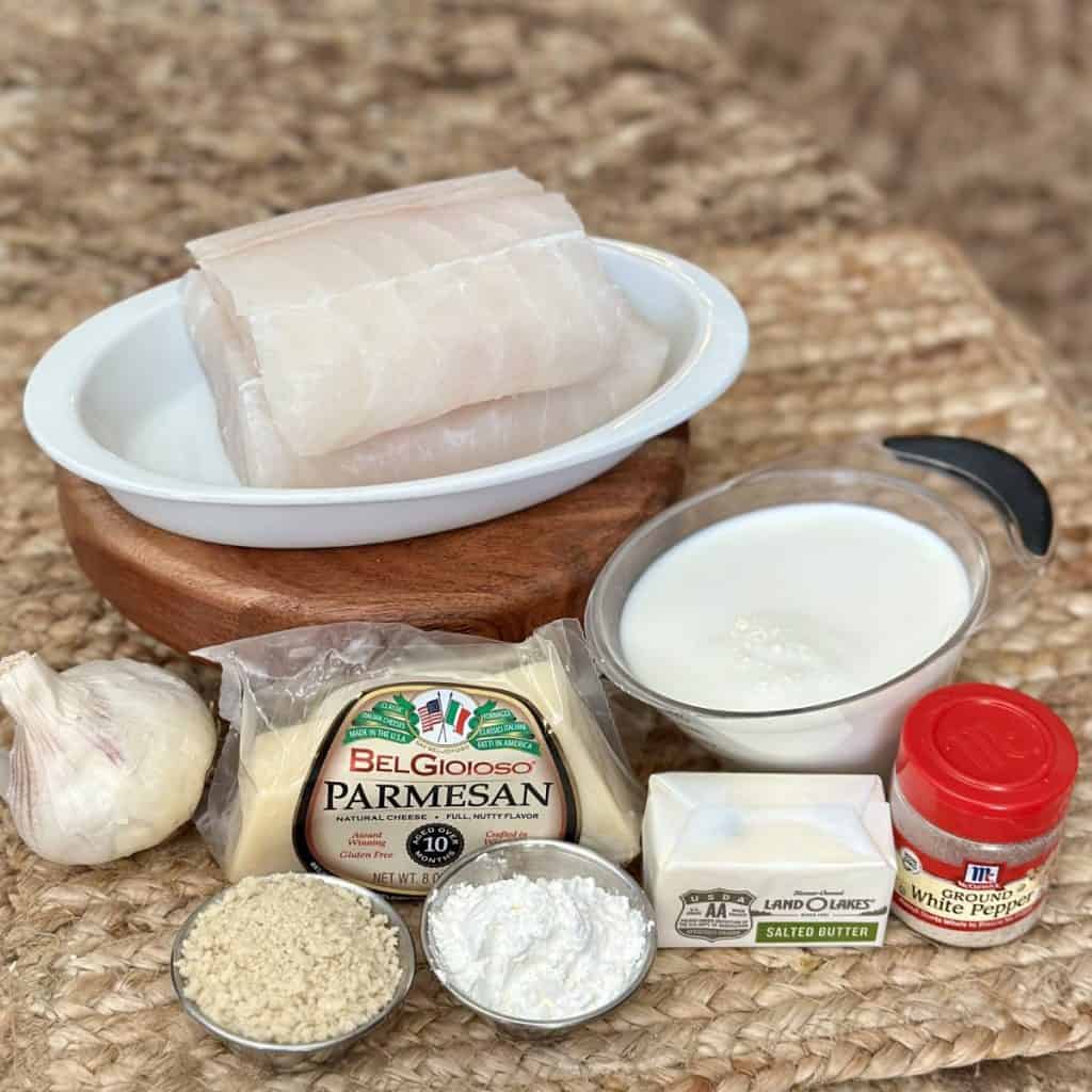 The ingredients to make a baked cod in cream sauce.