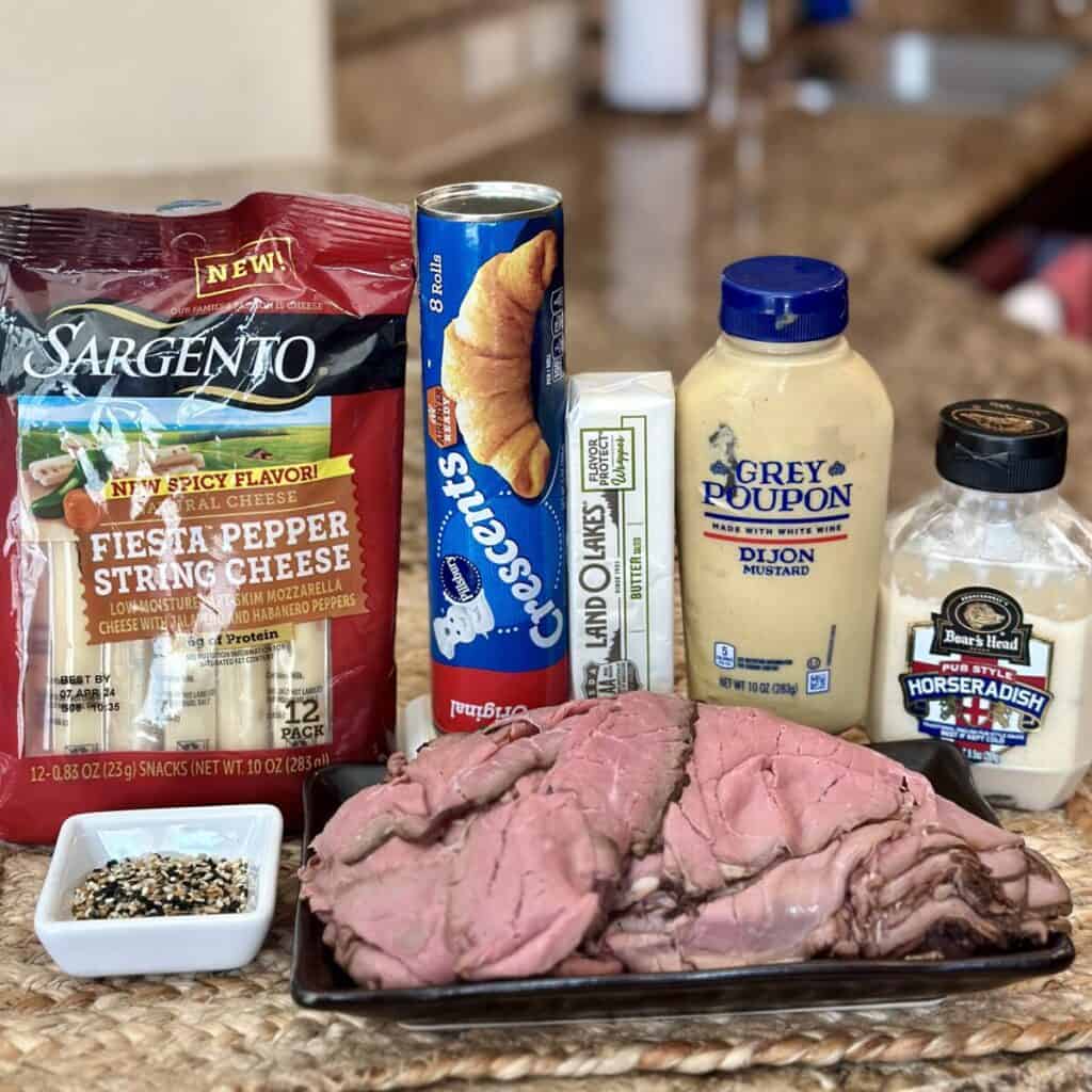 The ingredients to make steak and cheese rollups.