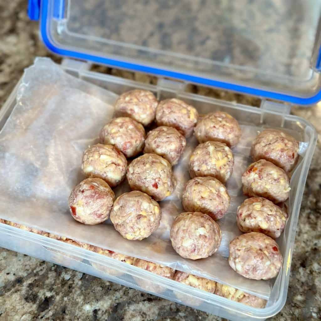 A container of sausage ball dough.