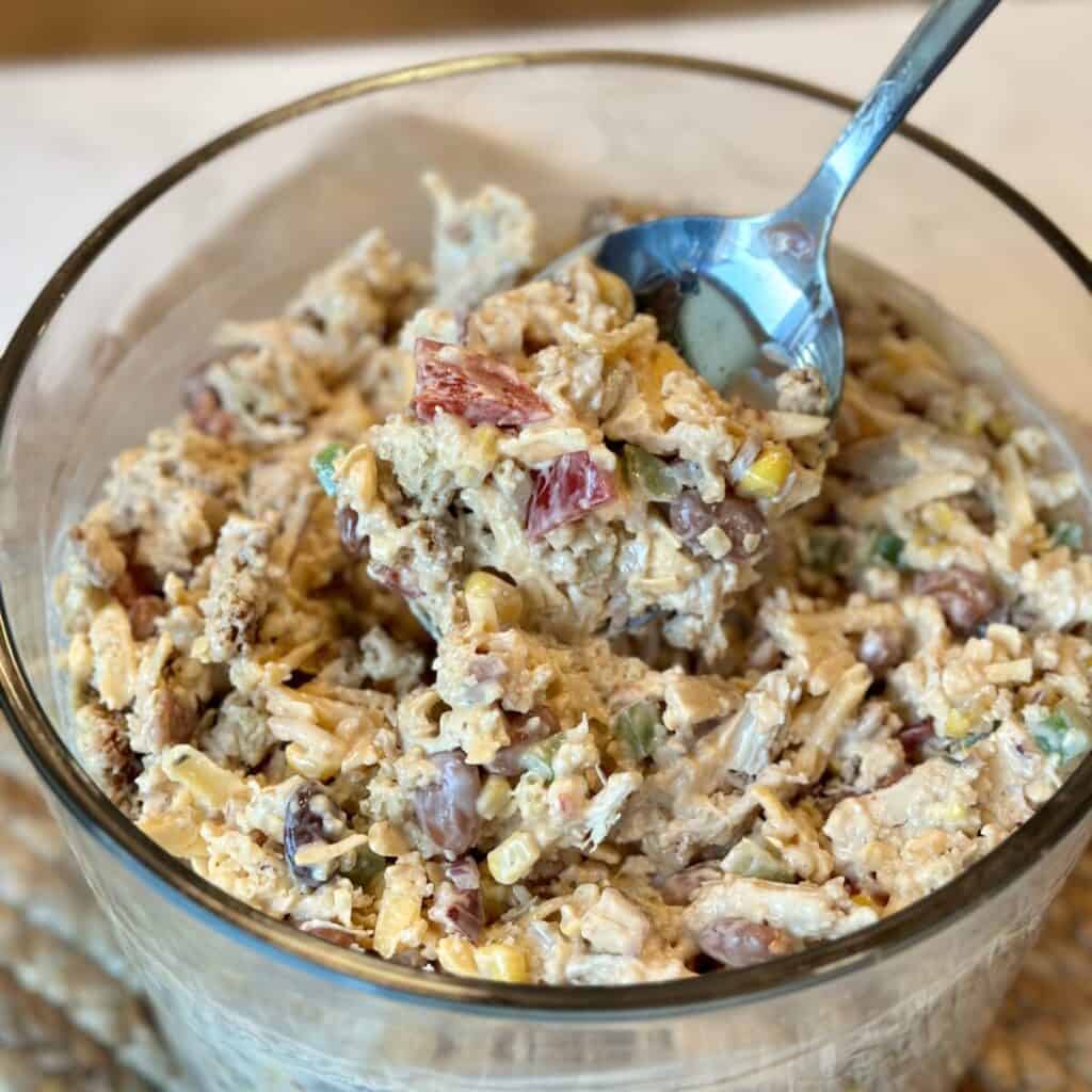 A spoonful of cornbread chicken salad.