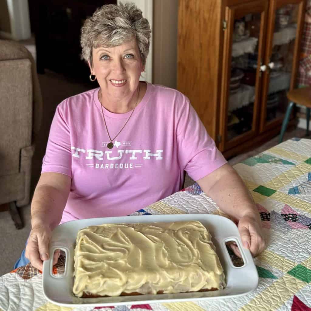 Phyllis with her white chocolate cake.