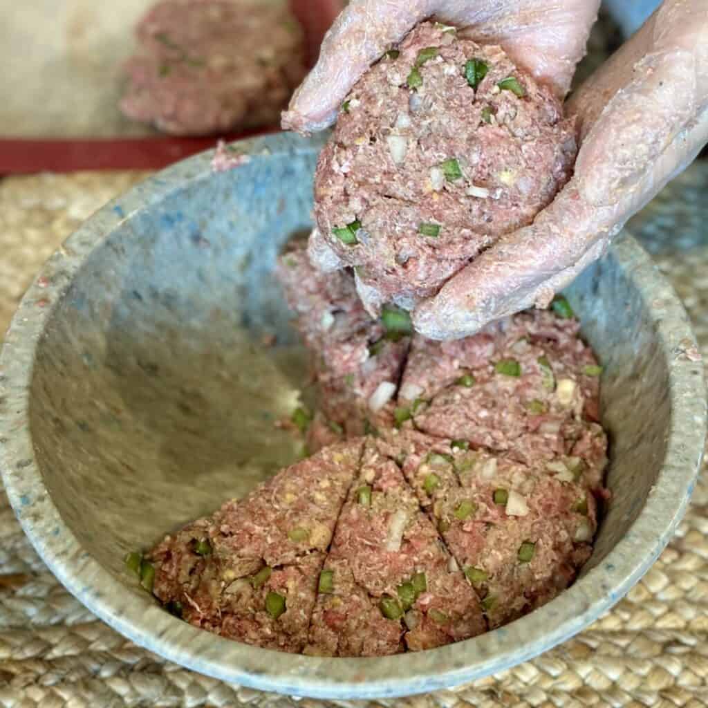 Patting out Salisbury meat patties.