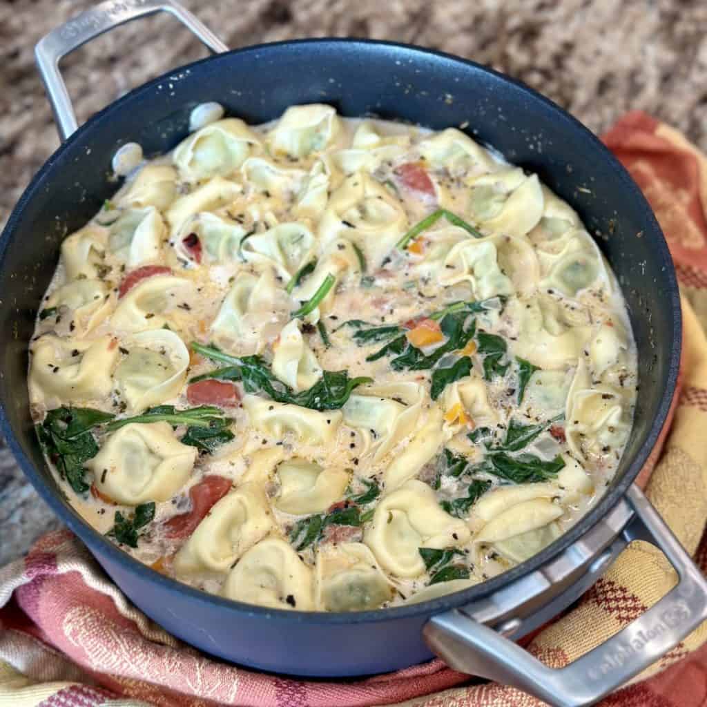 A pot of tortellini sausage soup.