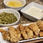 This is a picture of a cube steak finger dinner and gravy meal.