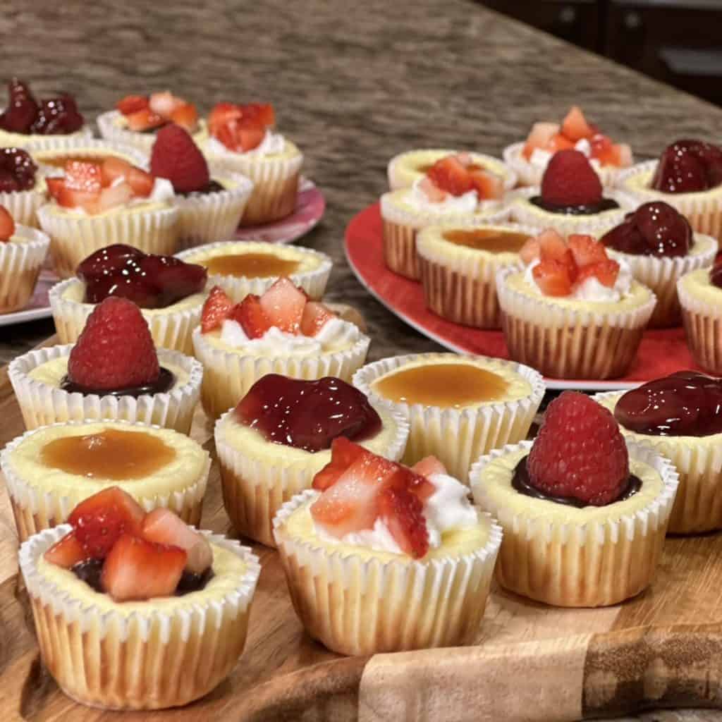 A close up shot of mini cheesecakes.