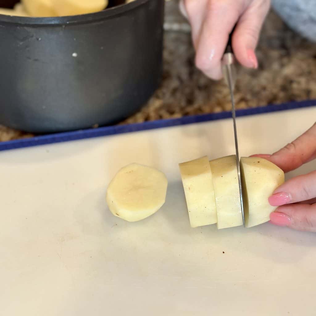 Chopping potatoes to be cooked