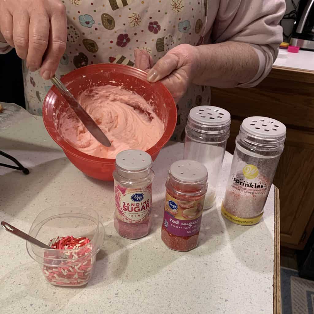 making the frosting for cut out cookies