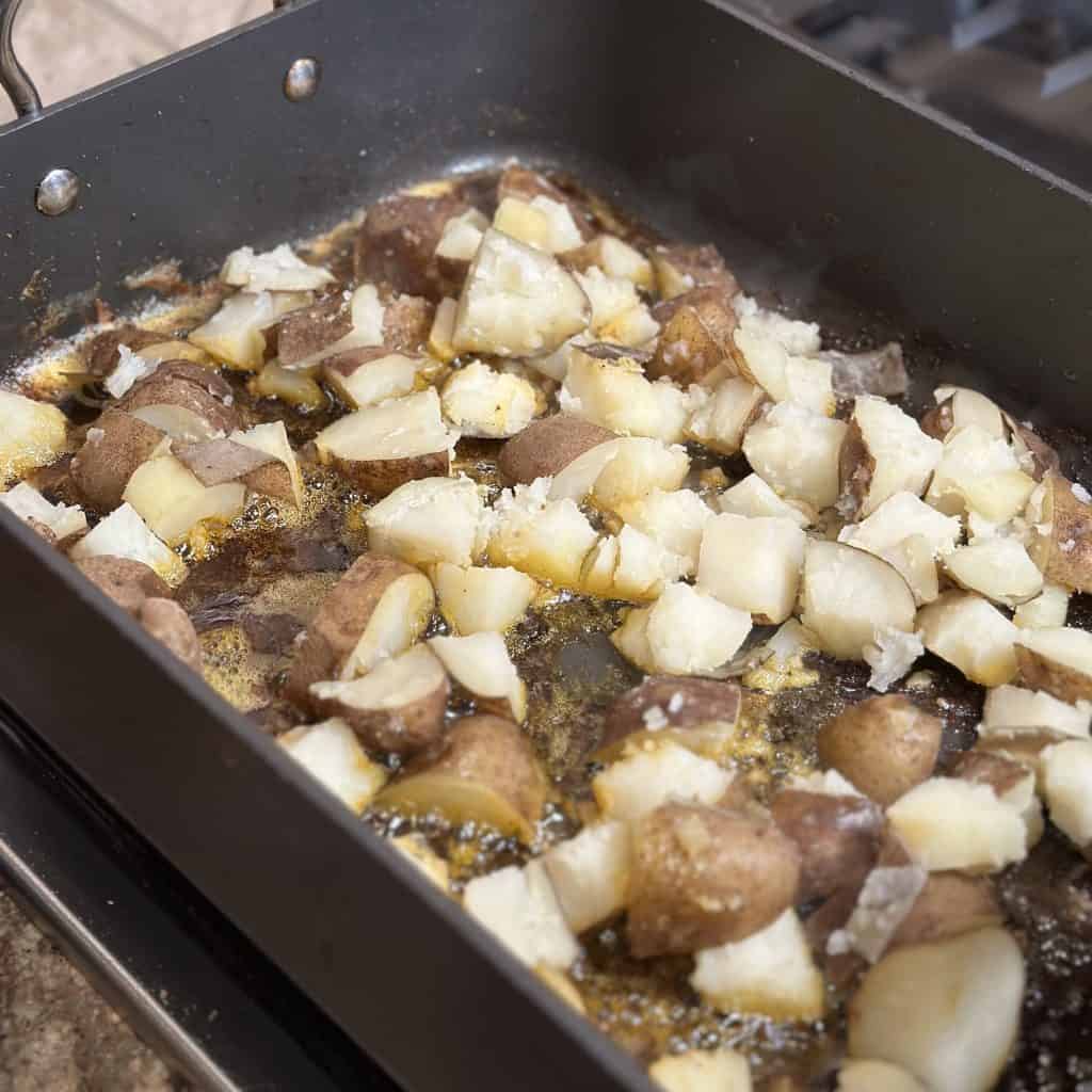 potatoes cooking in the frying pan