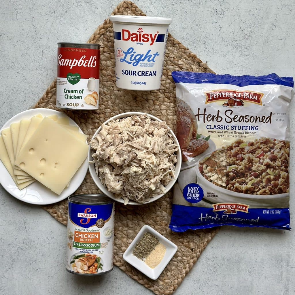 Ingredients for Swiss Chicken Stuffing Casserole displayed on a decorative mat