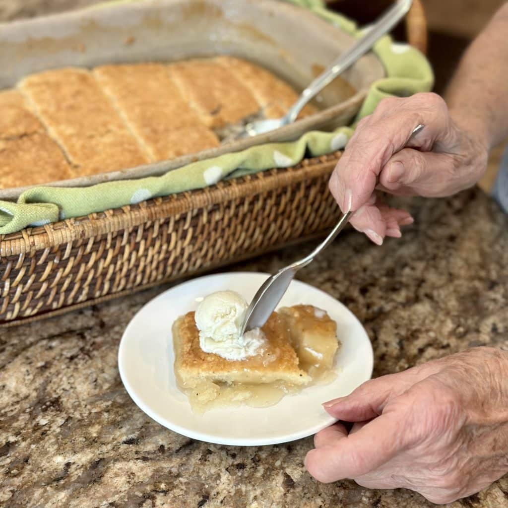 serving a fresh baked roll on a plate