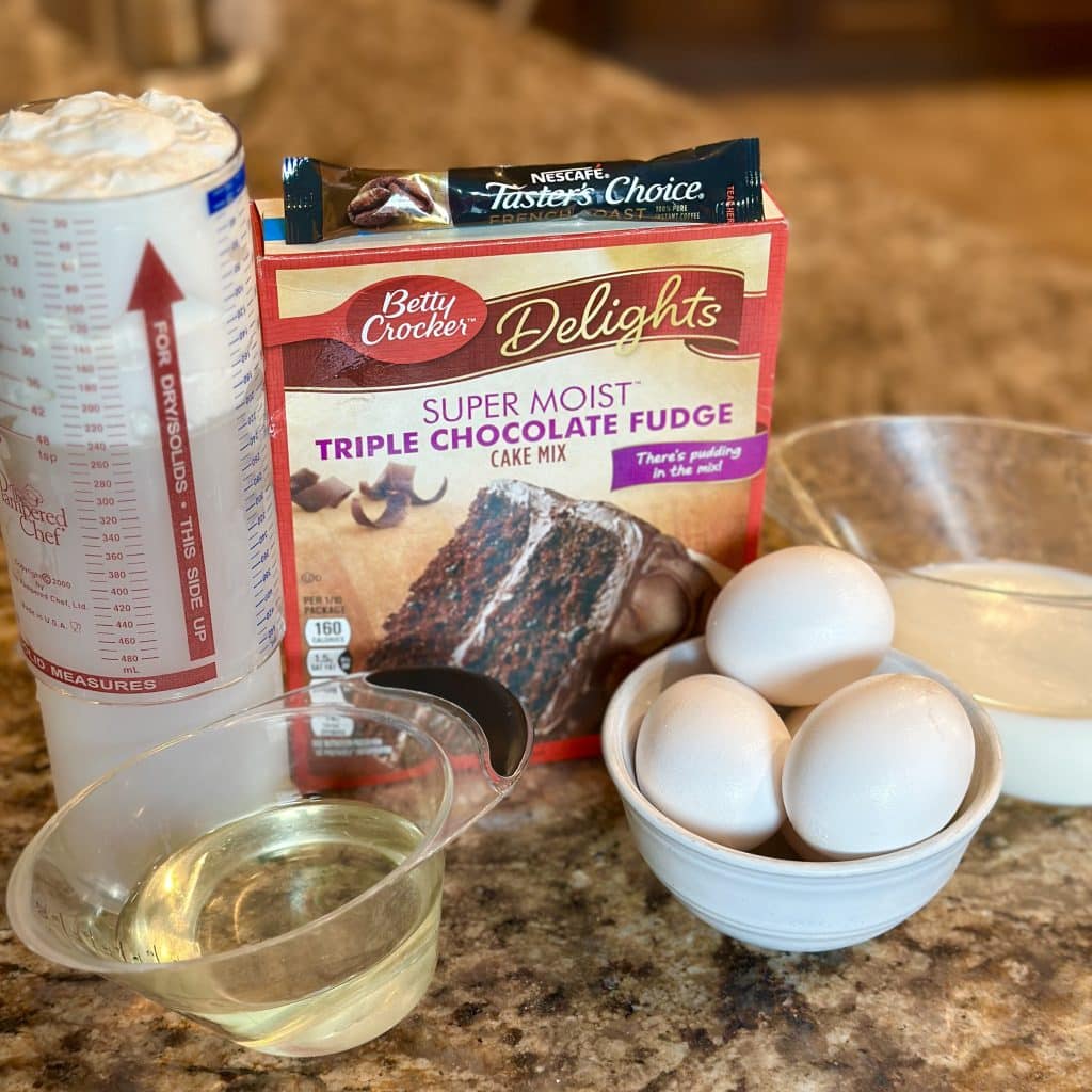 Ingredients for Chocolate Mocha Tres Leches cake, including boxed cake mix