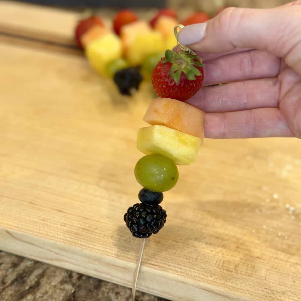 bite sized piece sof fruit on a skewer