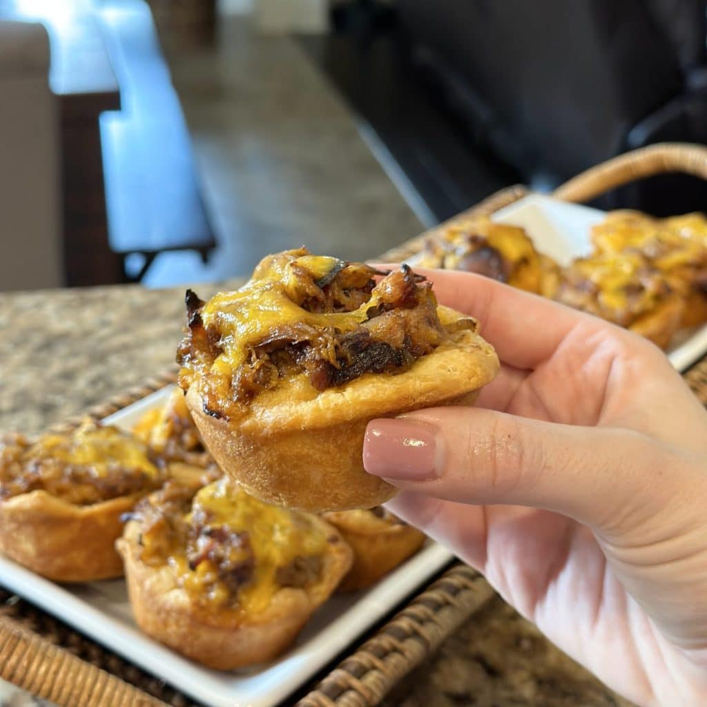 Biscuit dough crust with cheesy barbecue pulled pork filling