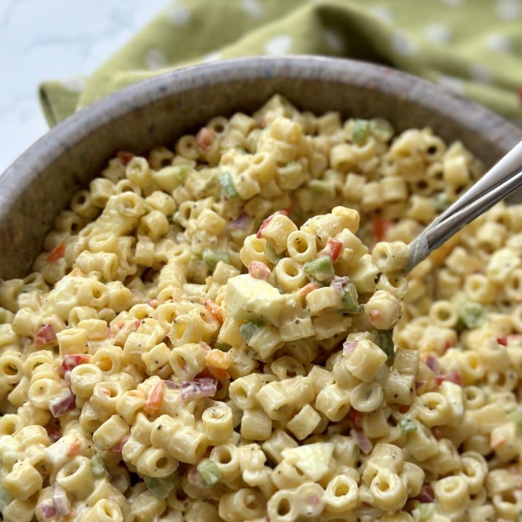 A bowl of macaroni salad.