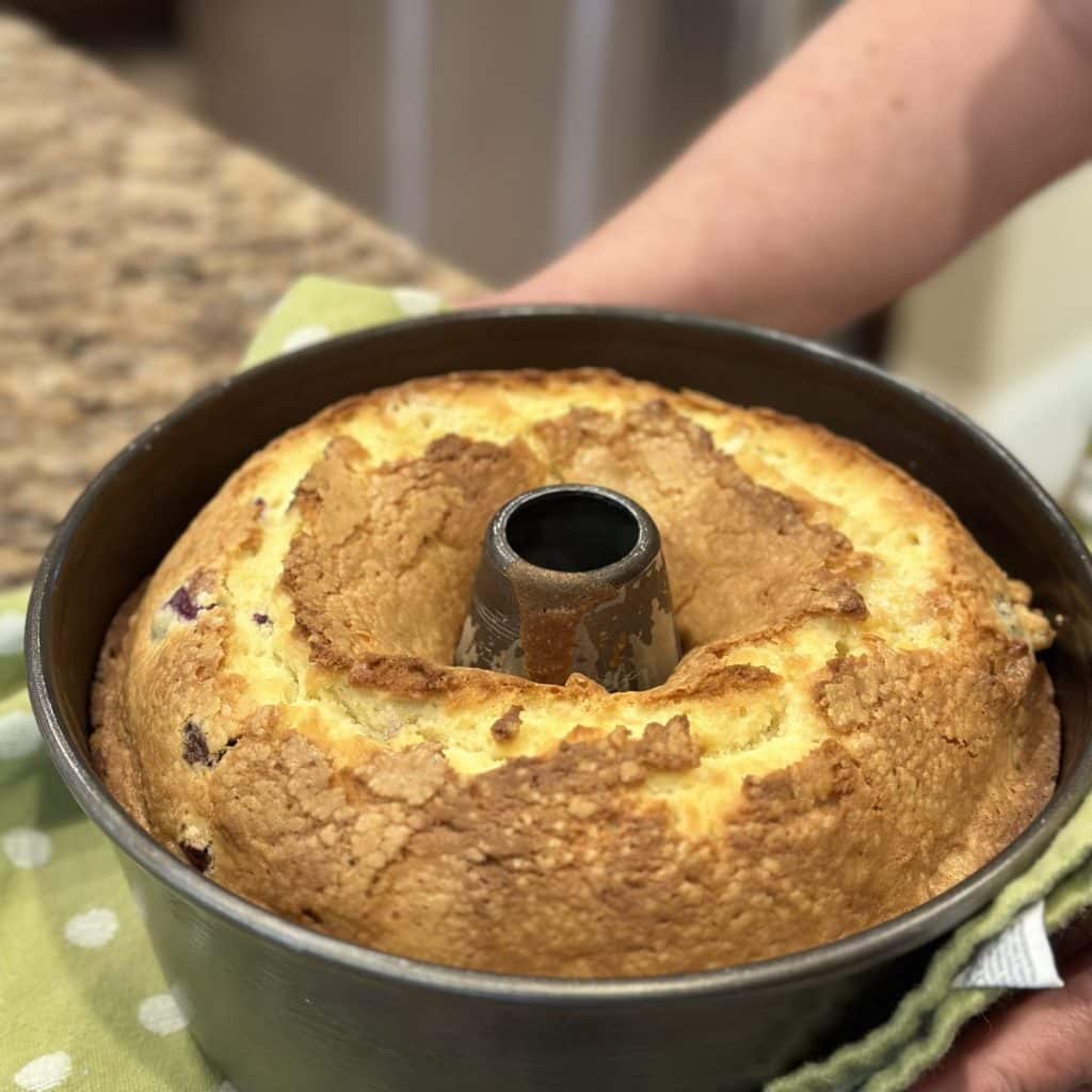 A baked pound cake in a tube pan.