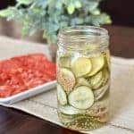 Homemade overnight pickles in a jar.