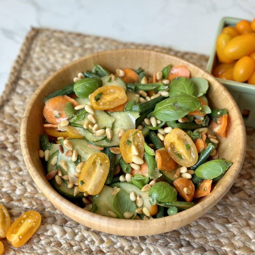 A bowl of green bean salad.