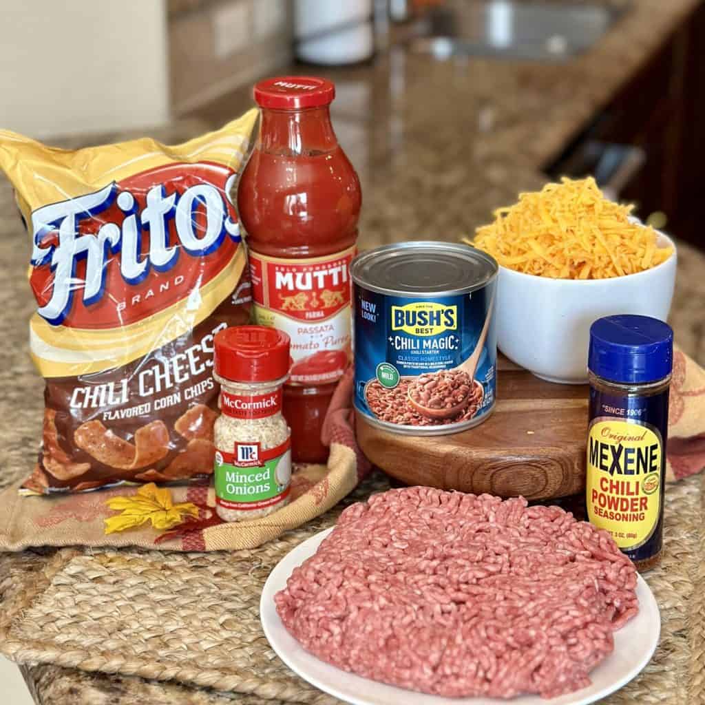 The ingredients to make a Frito chili pie.