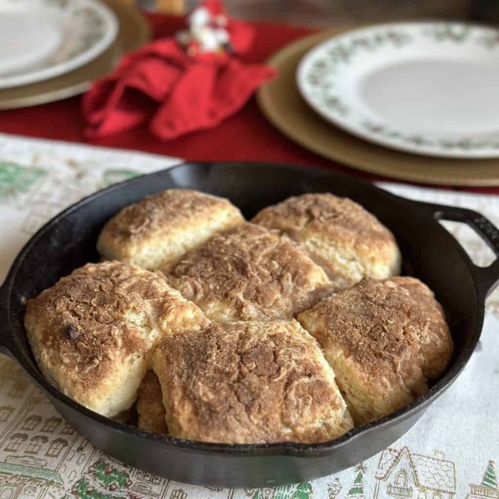 Baked cinnamon streusel biscuits in a cast iron pan.