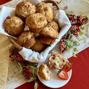 A basket of strawberry muffins.