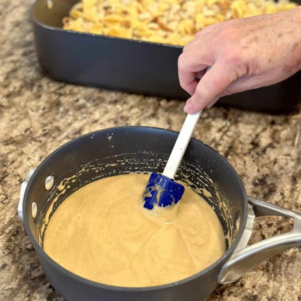Making caramel sauce in a sauce pan.