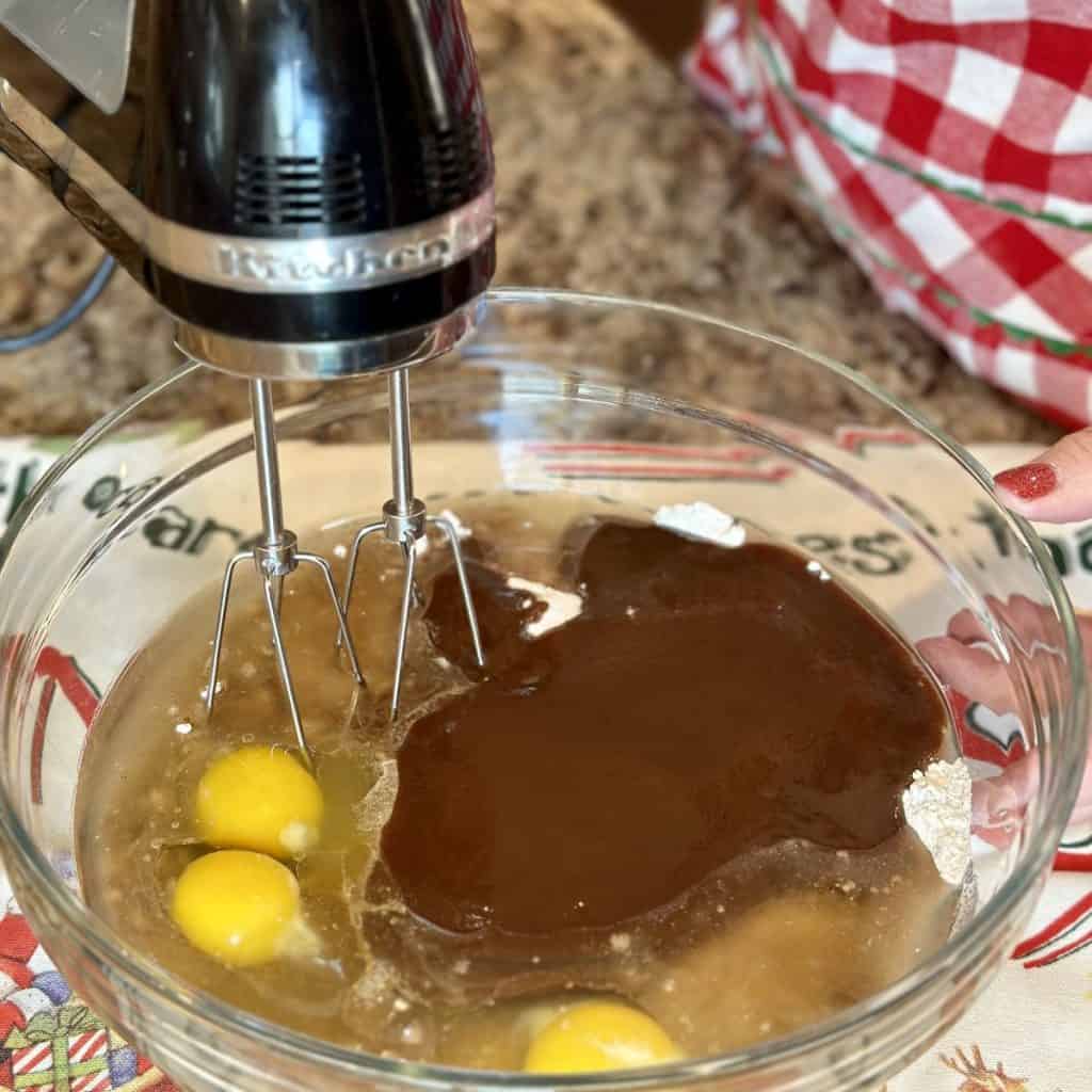 Wet ingredients in a bowl for spice cake.