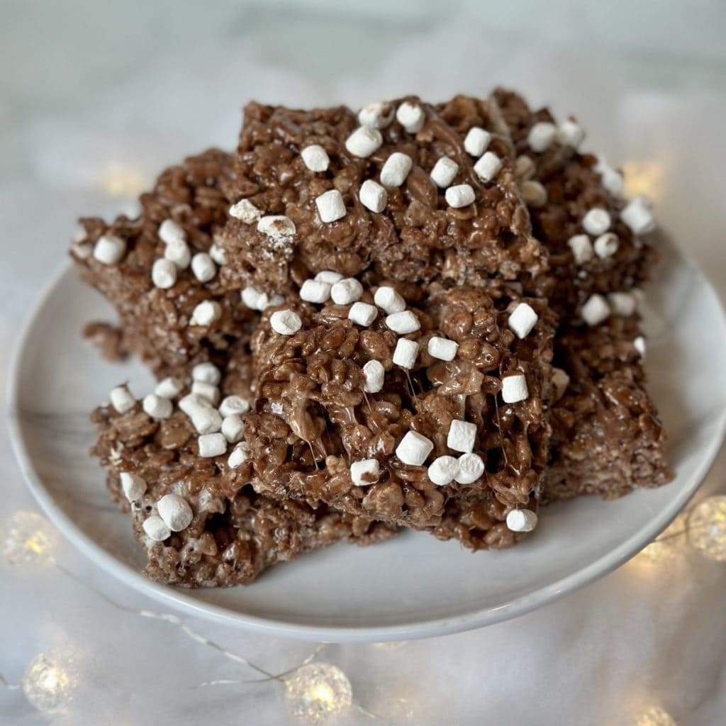 A close up shot of a plate of hot chocolate Rice Krispies.