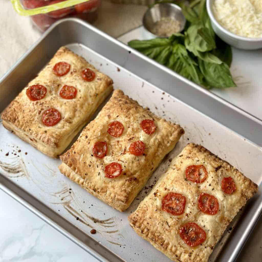 Pizza pop tarts on a sheet pan.