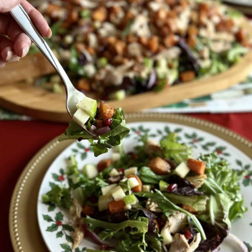 A bite of an easy winter salad on a fork.