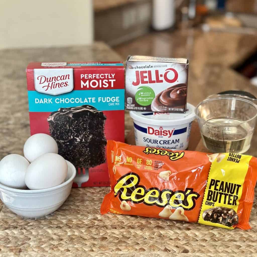 The ingredients to make a chocolate peanut butter cake.