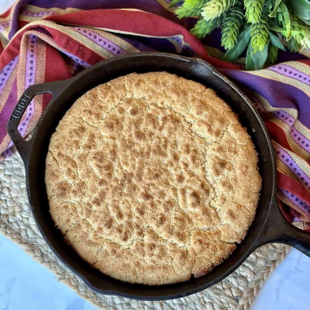 A cast iron skillet of cornbread.