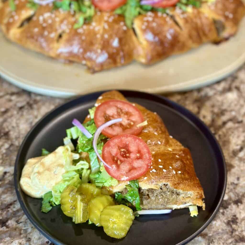 A slice of cheeseburger crescent ring.