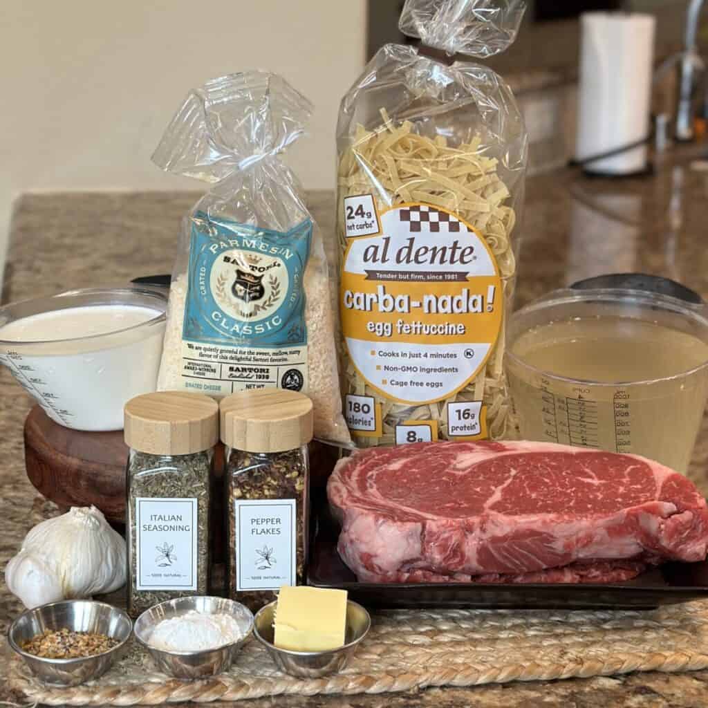 The ingredients to make steak pasta.