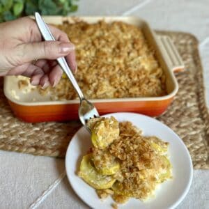 Getting a bite with a fork of squash casserole.