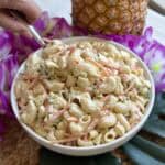 A bowl of Hawaiian pasta salad with pineapple.