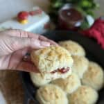 Butter and jam on an easy buttermilk drop biscuits.