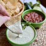 A bowl of copycat Chuy’s creamy jalapeño dip with chips and salsa.